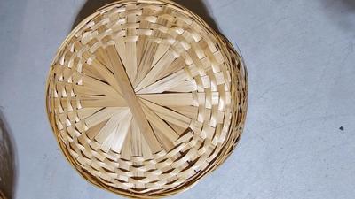 Variety of wicker baskets with doilies