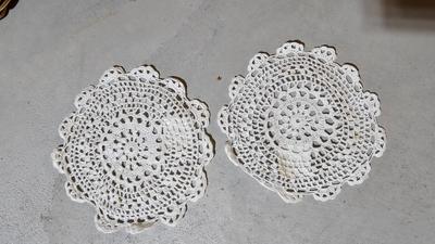 Variety of wicker baskets with doilies