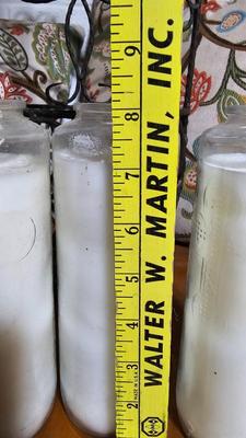 Wrought Iron basket with candles and two throw pillows