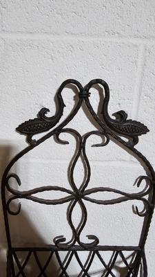 Wrought Iron basket with candles and two throw pillows