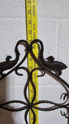 Wrought Iron basket with candles and two throw pillows