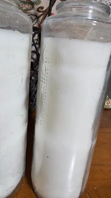 Wrought Iron basket with candles and two throw pillows