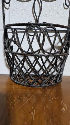 Wrought Iron basket with candles and two throw pillows