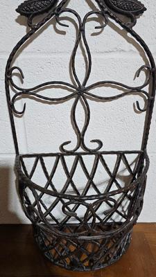 Wrought Iron basket with candles and two throw pillows