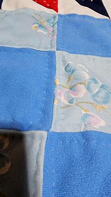 Handmade patchwork quilt with two nice feather pillows