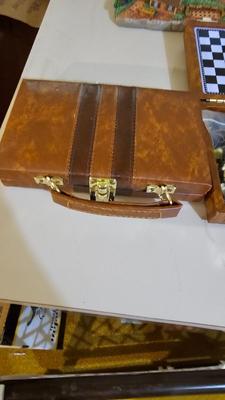 Cool Summit trail cribbage board and an assortment of playing cards and travel games