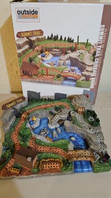 Cool Summit trail cribbage board and an assortment of playing cards and travel games