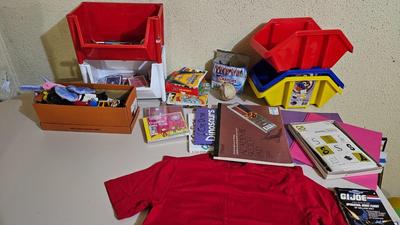 Stacking storage organizers with assortment of kid toys and crayons