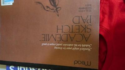 Stacking storage organizers with assortment of kid toys and crayons