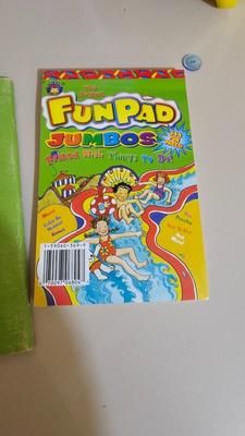 Stacking storage organizers with assortment of kid toys and crayons