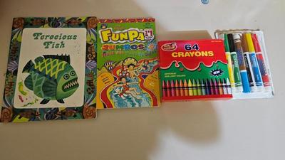 Stacking storage organizers with assortment of kid toys and crayons