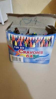 Stacking storage organizers with assortment of kid toys and crayons