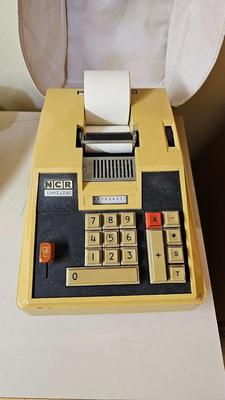 Desktop rotary telephone NCR petite electric adding machine