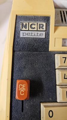 Desktop rotary telephone NCR petite electric adding machine