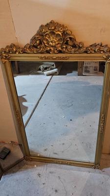 Early era Antique large mirror with ornate gold wooden frame