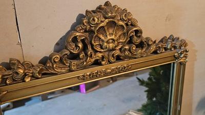 Early era Antique large mirror with ornate gold wooden frame