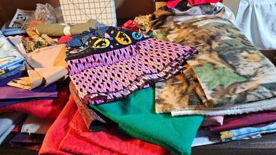 Small fabric scraps for quilting or sewing with wright's pattern board and quilting tools and more