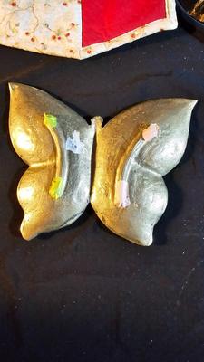 Hall tea pot with pillar candles and brass butterfly