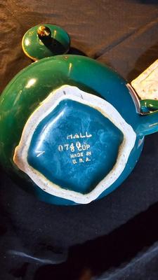 Hall tea pot with pillar candles and brass butterfly