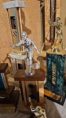 Vintage horsehoe and shooting trophys