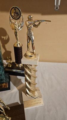 Vintage horsehoe and shooting trophys