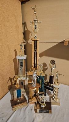 Vintage horsehoe and shooting trophys