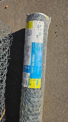 New roll 48" Hex netting fence with pitchfork and shovel heads