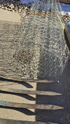 New roll 48" Hex netting fence with pitchfork and shovel heads