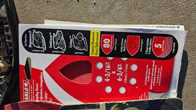 Black and Decker sander with sandpaper