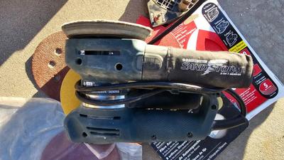 Black and Decker sander with sandpaper
