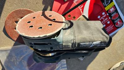 Black and Decker sander with sandpaper