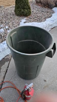 Trash can, fire extinguisher, extension cord