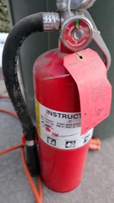 Trash can, fire extinguisher, extension cord