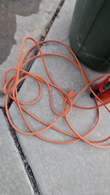 Trash can, fire extinguisher, extension cord