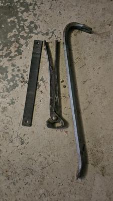 Large crowbar, long handled snips and a file