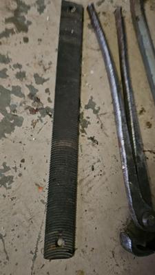 Large crowbar, long handled snips and a file