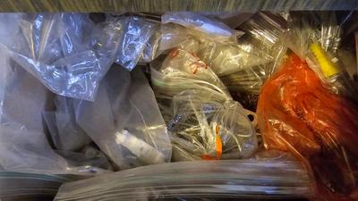 Two drawers of household hardware - screws - nails - small tools and more