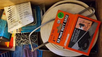 Two drawers of household hardware - screws - nails - small tools and more