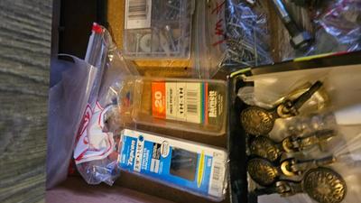 Two drawers of household hardware - screws - nails - small tools and more