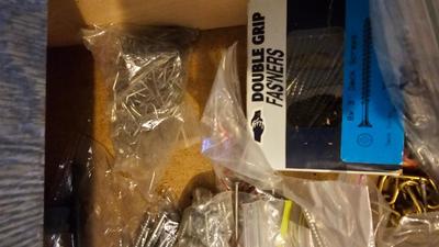 Two drawers of household hardware - screws - nails - small tools and more