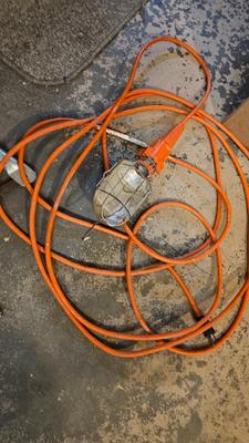 Extended Light bulb changer pole, extension cord and fire extinguisher