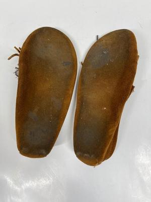 Minnetonka Moccasins in lightly used condition.