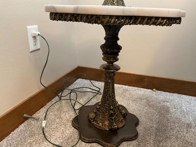 Bronze lamp and marble tabletop attached