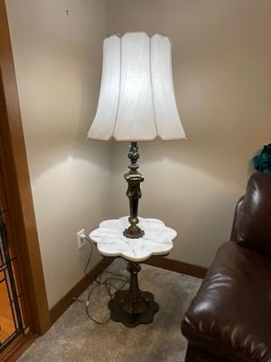 Bronze lamp and marble tabletop attached