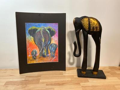 Elephant reprint and African statue