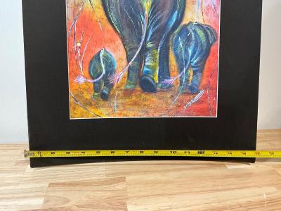 Elephant reprint and African statue
