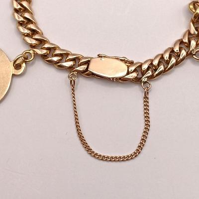 LOT 28: Vintage 18K Gold Bracelet with Charms 39.7gtw