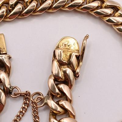 LOT 28: Vintage 18K Gold Bracelet with Charms 39.7gtw