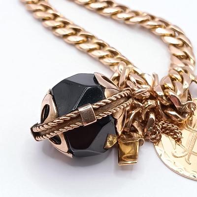 LOT 28: Vintage 18K Gold Bracelet with Charms 39.7gtw