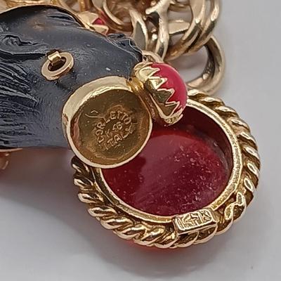 LOT 35: 14K Gold Charm Bracelet w/ 18K Corletto Blackamoor Pendant, 14K Carnelian Charm, 14K Handpainted Lady &Bead. 22.7gtw